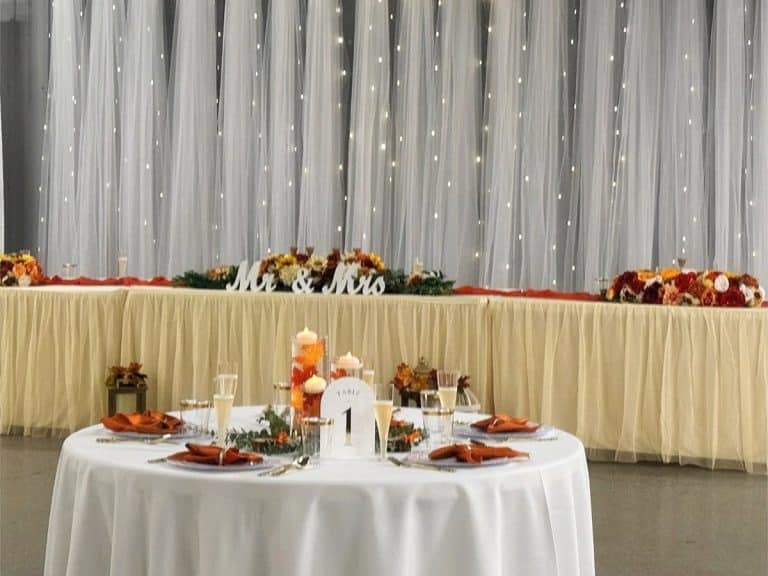 A head table set for a wedding reception at the Hartman Conference Center