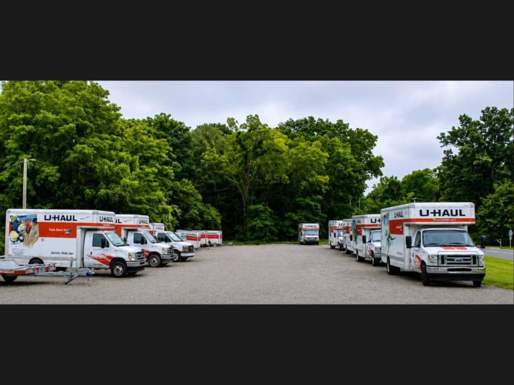 U-Haul trucks and trailers lined up in the Allegan U-Stor lot