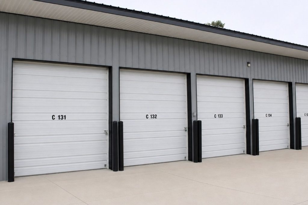 A row of outdoor storage units at Allegan U-Stor