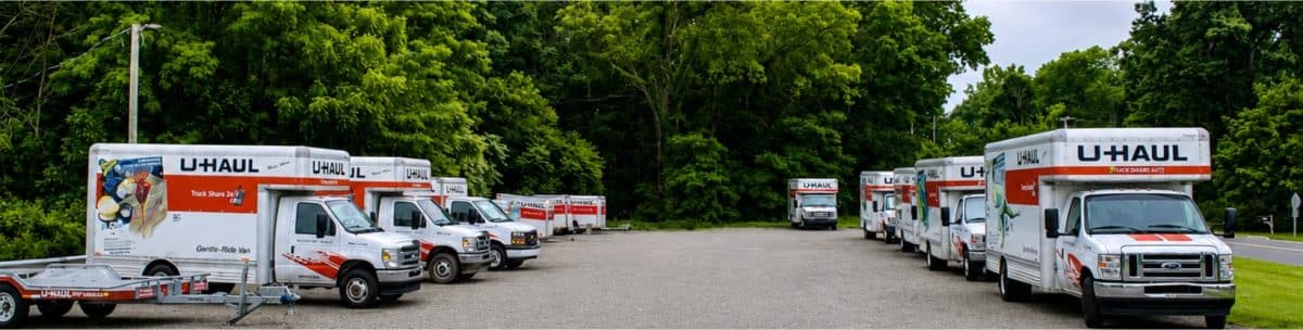 U-Haul trucks and trailers lined up in the Allegan U-Stor lot